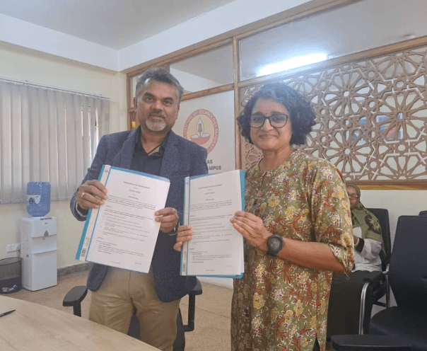 Image of signing of MOU with Zanlink