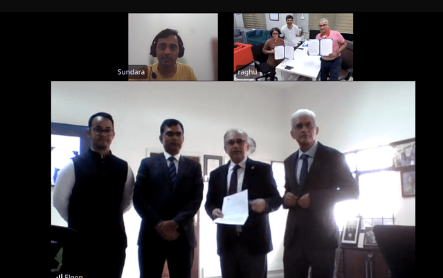 Image of signing of MOU with Elgon
